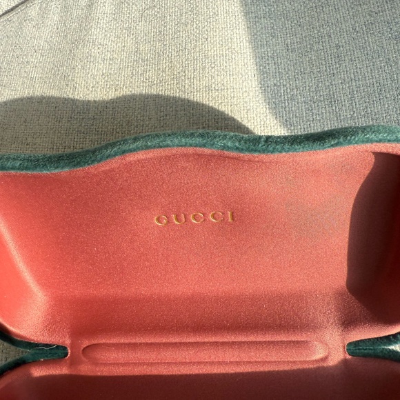 Gucci Black Oval Sunglasses